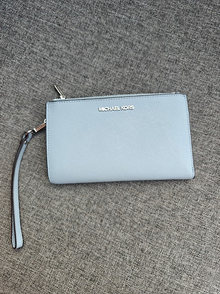 Michael Kors Jet Set Travel -lompakko/rannelaukku
Erinomaisessa