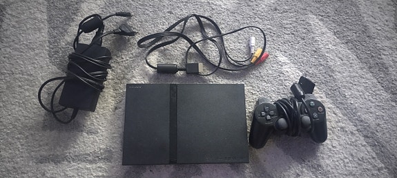 PlayStation 2 Slim + BUZZ!