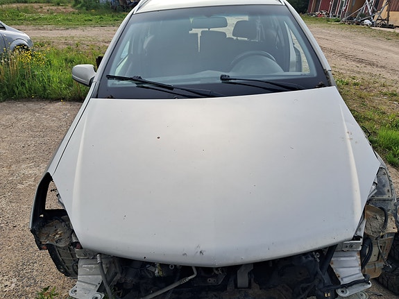 opel astra h konepelti