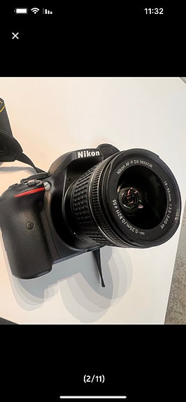 Nikon järjestelmäkamera objektiivilla