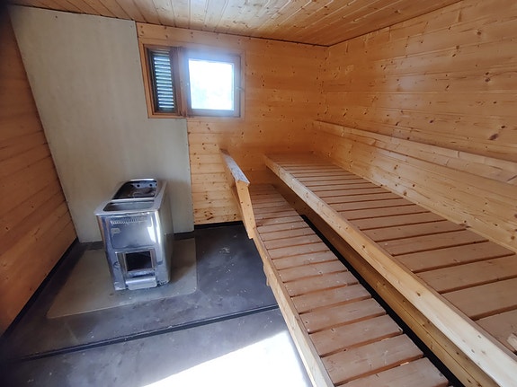 Siirrettävä sauna vaihtolavakiskoilla