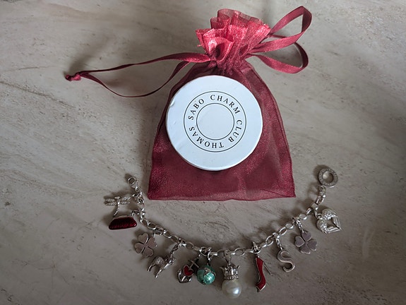 Thomas Sabo sterling silver (925) bracelet + 10 charms. Bracelet is appr. 17 cm