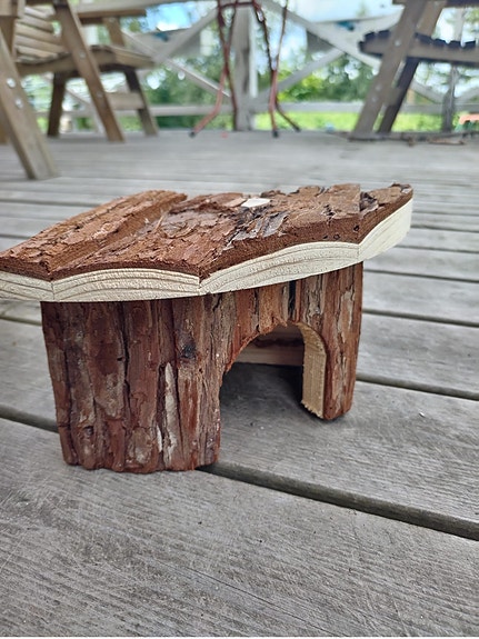 Hamsterin mökki ja seinä