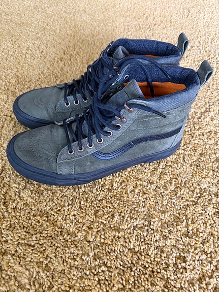 Nahkaiset Vans-tossut.