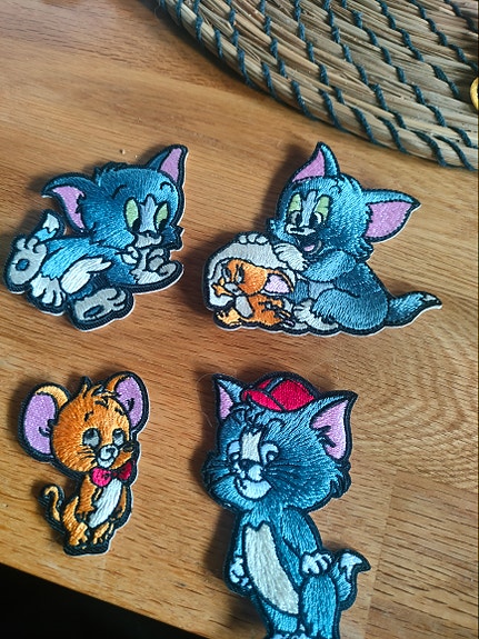 Tom ja Jerry kangasmerkit