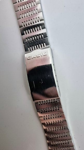 CASIO Casiotron X-1s S-14 (muissa?) rannekello ranneke
teräsranneke 70's vintage