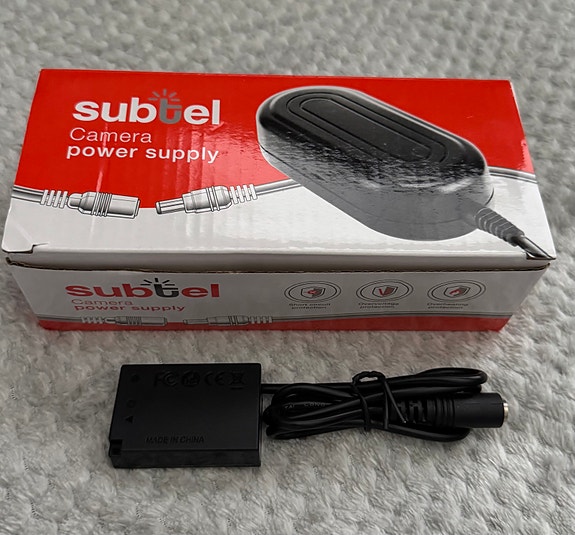 Subtel virtalähde Canon kameraan