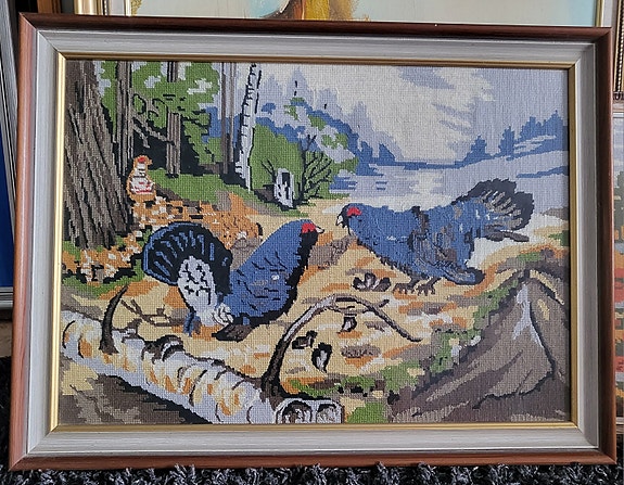 Taistelevat metsot puukehyksillä