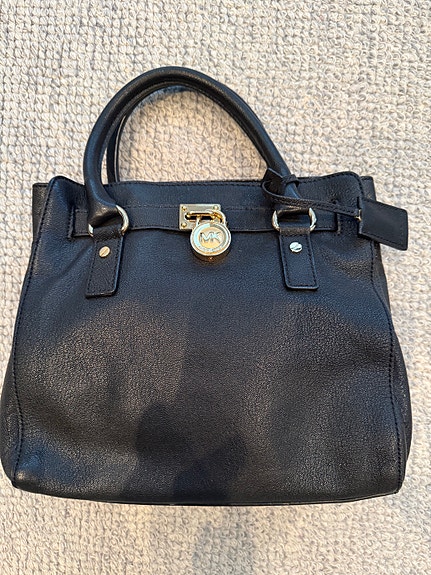 Michael Kors musta/kulta nahkalaukku