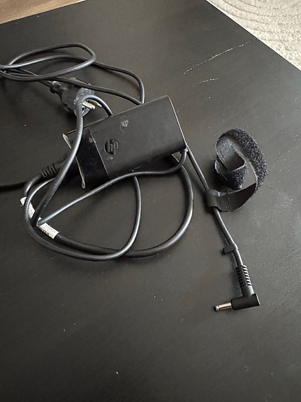 HP 65W kannettavan tietokoneen laturi