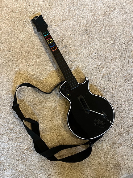 Guitar Hero -kitara Xbox 360:lle musta