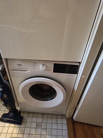 Edestä täytettävä pesukone