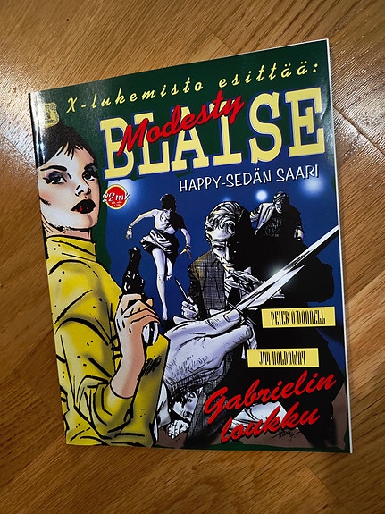 Modesty Blaise Happy sedän saari