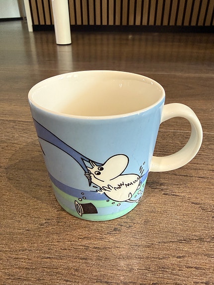 Muumimuki delfiinisukellus