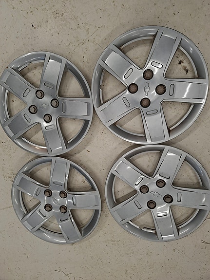 Chevrolet Aveo pölykapselit 14" vanteille