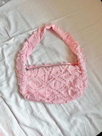 Pinkki farkkulaukku