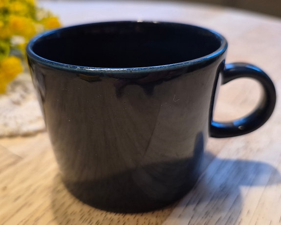 Teema sininen kahvikuppi