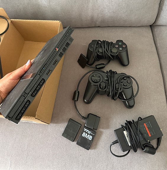 Sony PlayStation 2 Slim pelikonsoli musta + crash bandicoot