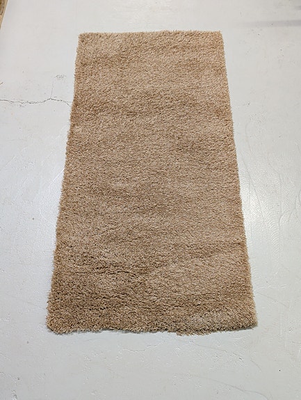 Beige nukkamatto