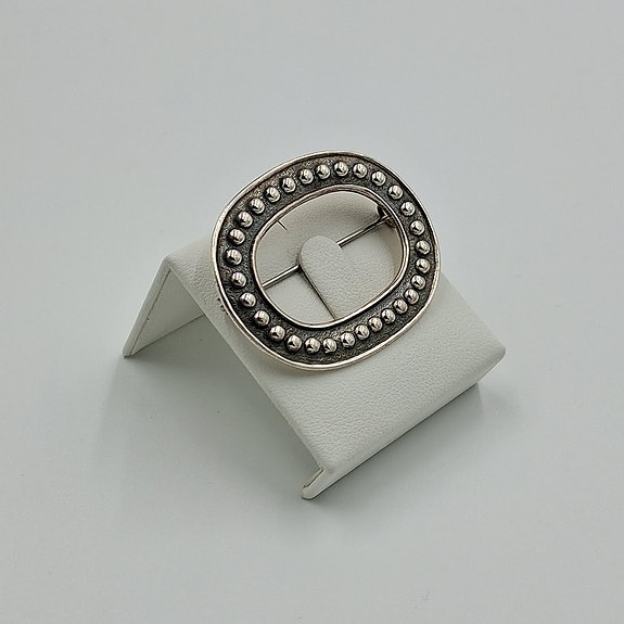 Rintakoru, design Holger Lindström, Kalevala Koru