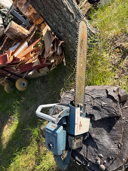Homelite  moottorisaha pitkällä laippalla