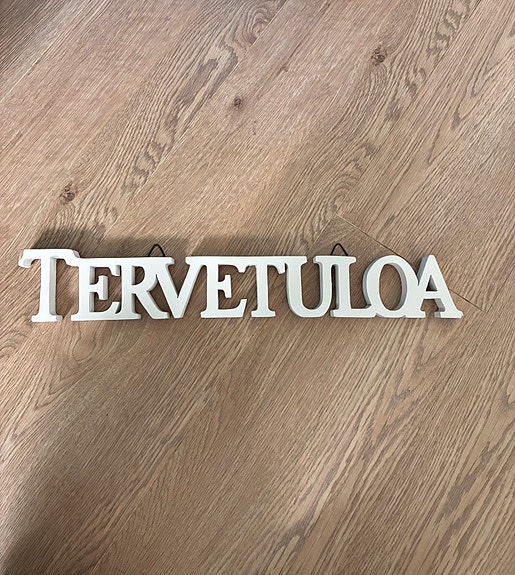 Tervetuloa-kyltti