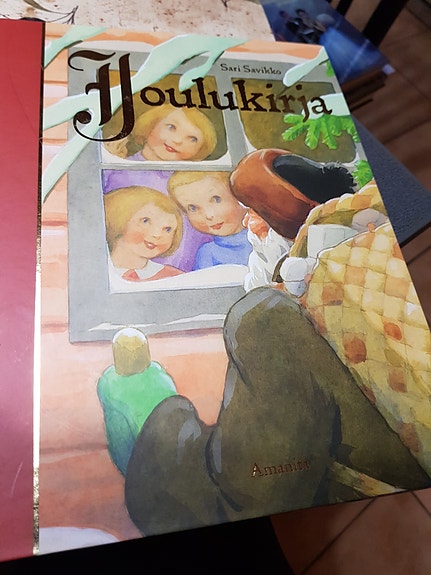 Joulukirja.  Sari Savikko.