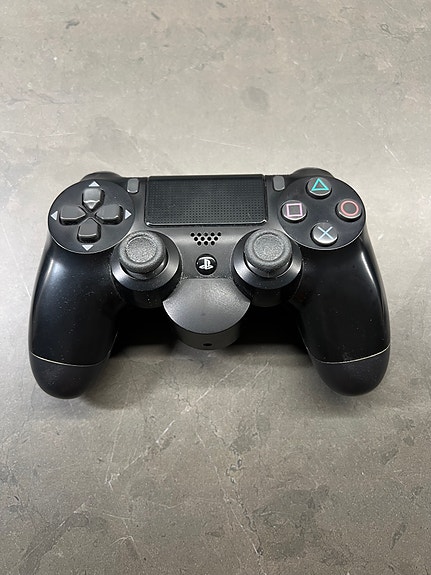 PS4 Dualshock ohjain + Playstation back button attachment