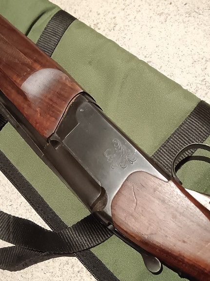 Baikal IJ-27 päällekkäispiippuinen haulikko 12/76