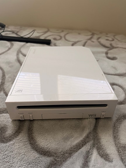 Nintendo Wii konsolin ohjekirjat ja johdot
