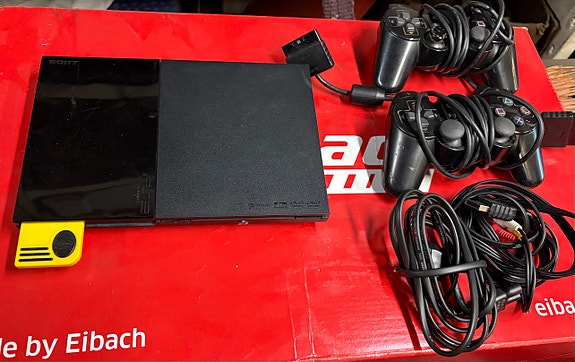 Sony PlayStation 2 Slim pelikonsoli musta