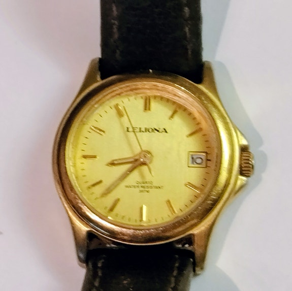 Leijona Quartz , naisten /nuorten ranne kello