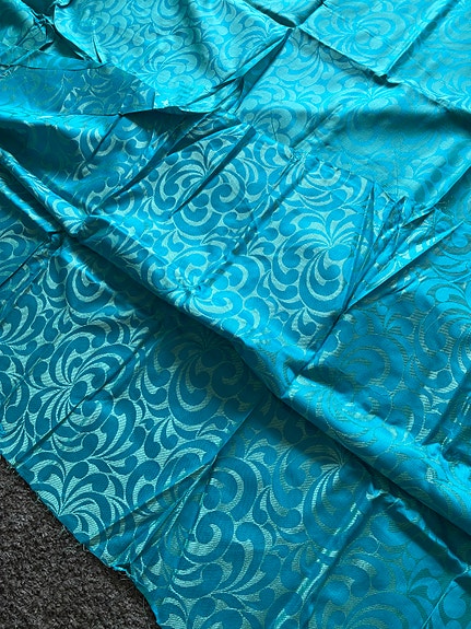 Turkoosi kuviollinen 100% silkki kangas