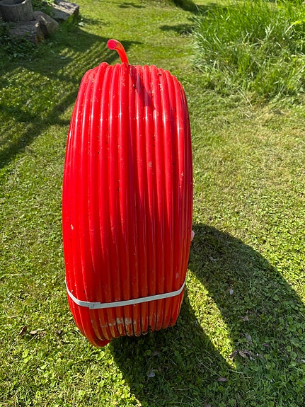 Punainen muoviputkikela 15 mm/50m