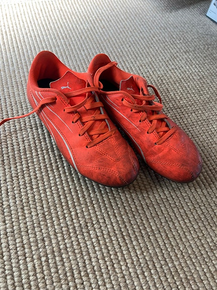 Puma nappulakengät koko 33 oranssi