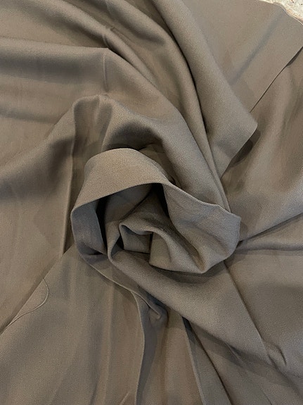Beige/harmaa joustava kangas