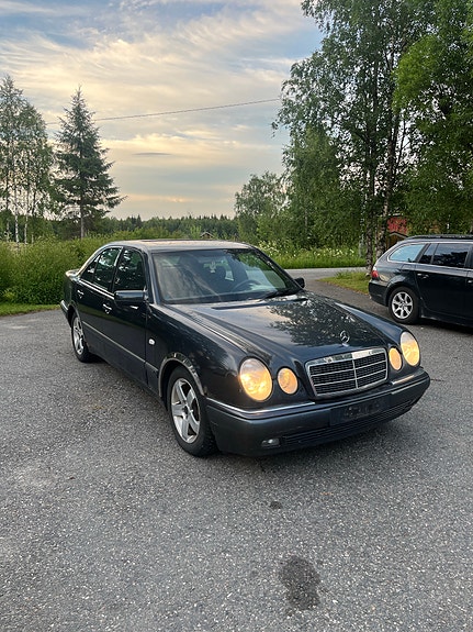 W210 osiksi