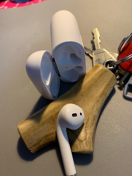 Apple langattomat nappikuulokkeet kotelolla