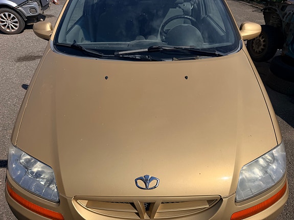 DAEWOO KALOS sedan konepelti ja kuljettajan ovi