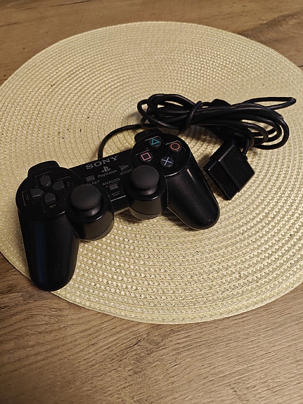 Sony PlayStation 2 ohjain musta