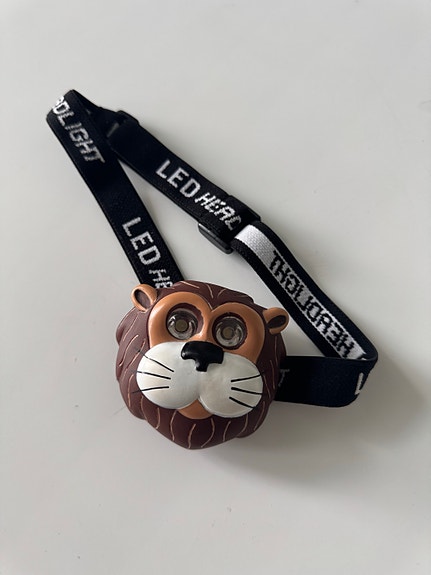Lasten leijona LED-otsalamppu