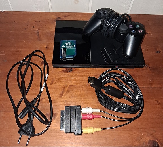 Ps2 slim + 18peliä + dualshock 2 ohjain