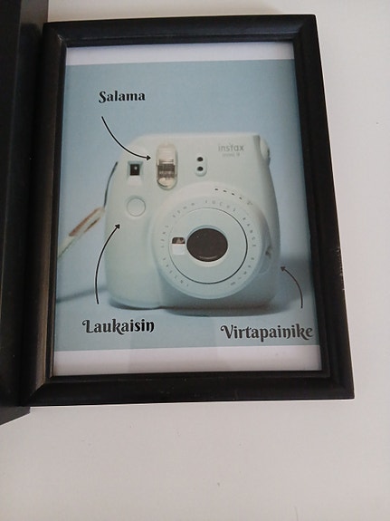 Polaroid Instax Mini 9 -kameran opastetaulut