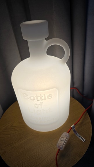 Eero Aarnio design Bottle of Light pöytävalaisin