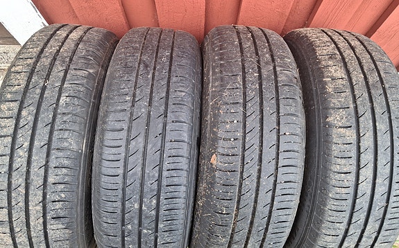 Kumho kesärenkaat Nissan Almeran vanteilla