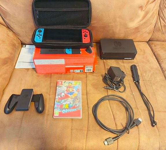 Nintendo Switch 1 + Super Mario Odyssey + suojakotelo – Erinomainen kunto