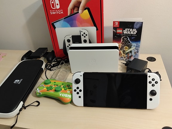 Nintendo Switch OLED + pelejä ja tarvikkeita