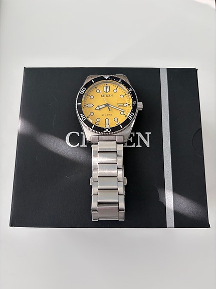 Citizen Marine Eco-Drive 3 Hands silver yellow rannekello