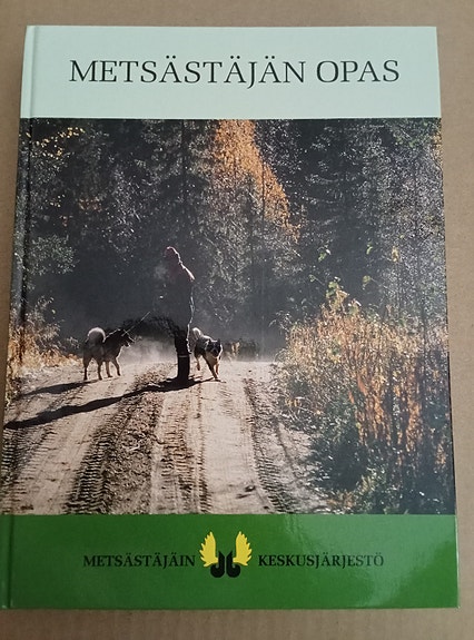 Metsästäjän opas - kirja ja kotelo