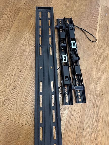 Samsung TV-seinäteline musta